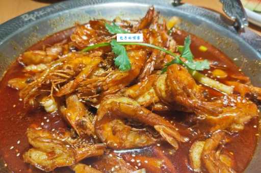 想知道焖大虾是哪里的菜系吗？答案在这里！